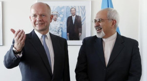 ODD COUPLE — British Foreign Secretary William Hague (left) and Iranian Foreign Minister Mohammad-Javad Zarif enjoyed a laugh at the UN last month in the first of three exchanges aimed at re-starting diplomatic relations. 