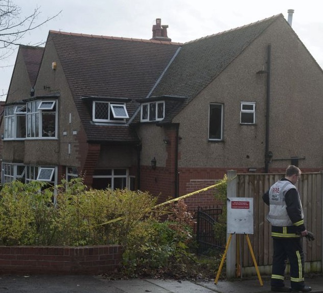 FIRE — English police check out the house where three Iranians died in a fire of suspicious origin.