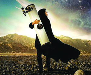 NIGHTWATCHER — Sepideh’s telescope is almost as big as she is.