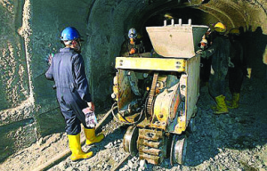 DIGGING AWAY — Machinery to dig up uranium ore is installed in the Gachine mine near Bandar Abbas.