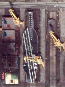 SHIP WITH NO ENGINE — Here is a satellite photo of the dummy aircraft carrier seen being built early this year in a Persian Gulf shipyard.