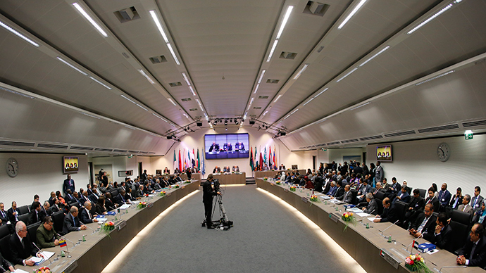 OPEC DELIBERATES — The giant hall in which OPEC ministers meet in Vienna looks more like a hanger to many observers. 