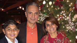 BUILT FIRM — Anoosheh Oskouian is seen with her husband and their son.