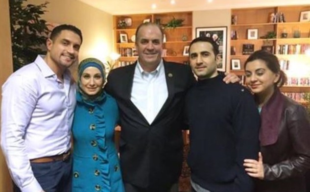 FILLING UP ON STEAK — Decompressing at the same base is Amir Hekmati (second from right), seen here with, from right, his sister Leila, his congressman, Dan Kildee, another sister, Sarah, and her husband, Ramy Kurdi.