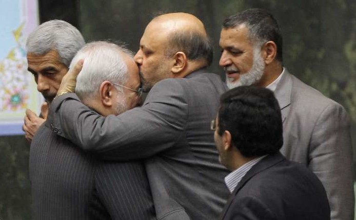 KISS — Foreign Minister Mohammad-Javad Zarif may be the man hardliners most love to hate, but many others think highly of him.  Here is how one unidentified Majlis deputy greeted Zarif last week when he visited the Majlis.