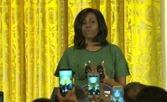 NOW HEAR THIS — The cellphone cameras went up as First Lady Michelle Obama spoke to the White House Now Ruz celebrants.