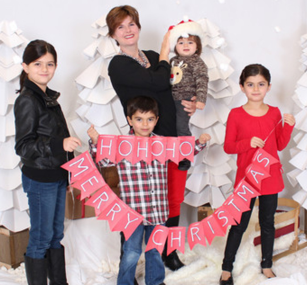 GONE—Mother Alison Azer is seen in a family photo with her children, from left, Shirvan, now 11, Dersim, now 7, Meitan, now 3, and Rojevahn, now 9.