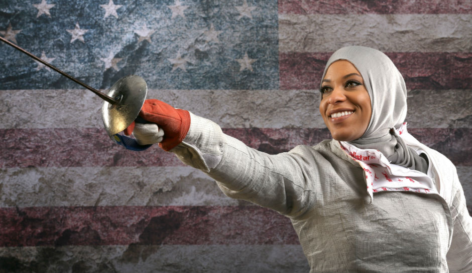 ARMORED — Ibtihaj Muhammad is an African-American Muslim on the US Olympic team.  She was encouraged to take up fencing because it is one sport that requires participants to be well-covered—armored, in fact.  When she competes, she must also wear a facemask as protection.