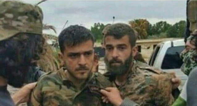 POWs — This is a photo released last December by Syrian rebels saying it shows two Pasdaran they captured.  Iran has not acknowledged any captives.