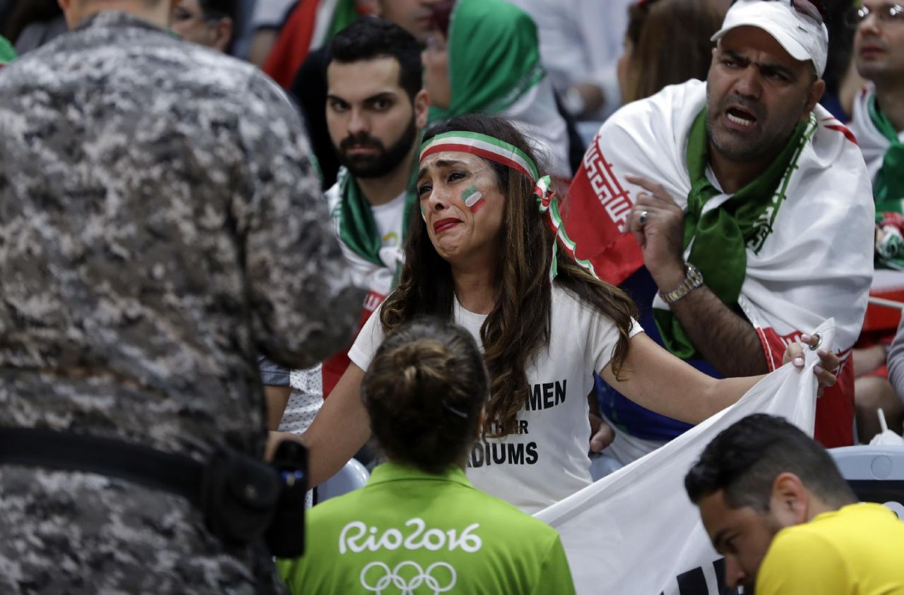 Olympic officials give in to crying Iranian