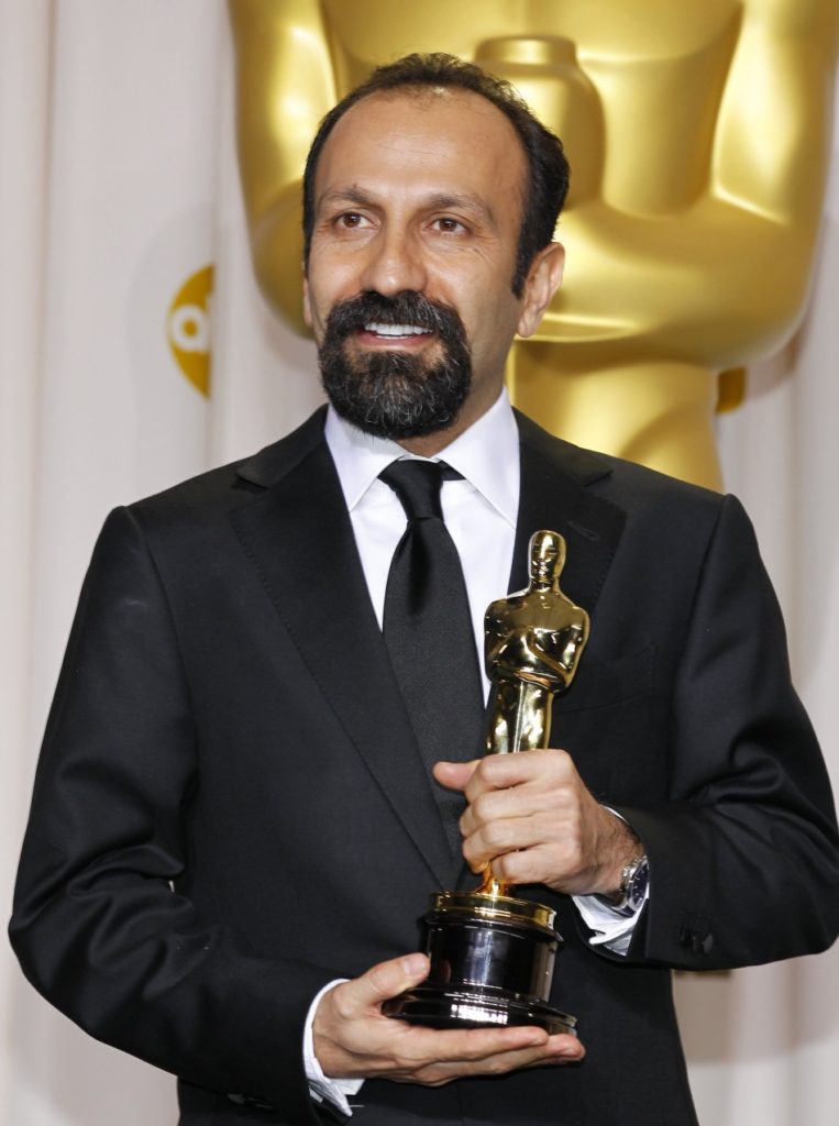 LOOKING FOR A MATCHED PAIR — Asghar Farhadi poses with the Oscar he received for “The Separation.”