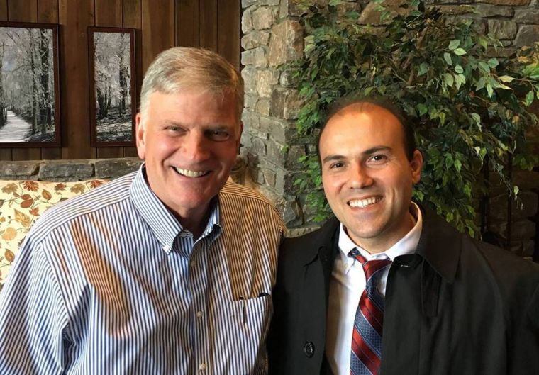 BEFORE — Evangelist Franklin Graham (left) with Saeed Abedini in happier days.