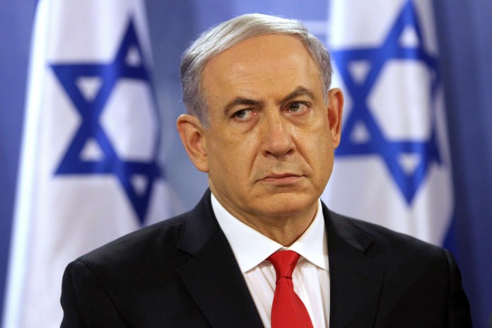 NETANYAHU. . . points fingers