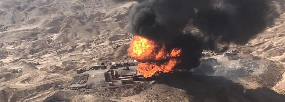 BURNING ISSUE — An oil rig fire is raging out of control in the Rag-e Sefid oilfield and may take as much as 60 days to extinguish.  The fire started October 29, killing four oilfield workers early on.  Saeed Qorbani, head of crisis management for the National Iranian Drilling Co., said it could take “between 50 and 60 days to fully extinguish the fire” since the blaze is in a remote, mountainous area of Khuzestan Province that makes it difficult to get equipment and water to the site.  Officials said they are building a new road right now to get better access the fire area.