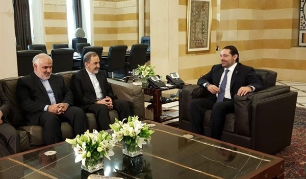 DIFFERENT STROKES — The day before resigning with an attack on Iran, Lebanese Prime Minister Saad Al-Hariri (right) met in his office in Tehran with Ali-Akbar Velayati (center), the senior foreign policy adviser to Supreme Leader Ali Khamenehi.