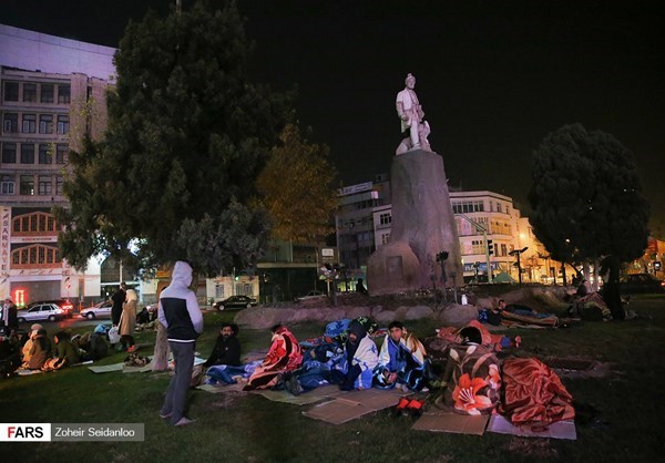 SHAKE, RATTLE AND ROLL — Many nervous Tehranis stayed outdoors all night long after a quake shook up the place shortly before midnight.