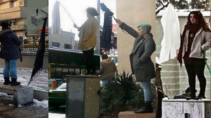 UNIQUE — In a highly unusual form of protest, women (and occasionally men) have been mounting pedestals (so they can easily be seen) and standing with bare heads while waving their headscarves on the end of a stick.