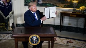 NO DEAL — President Trump shows off his signed order reimposing sanctions on Iran. 