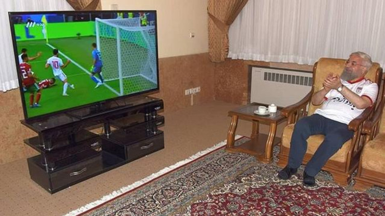 MAN OF THE PEOPLE — President Rohani released this photo of him watching the first Iran game in the World Cup in his living room, looking like a man of the people by wearing blue jeans and doffing his turban.