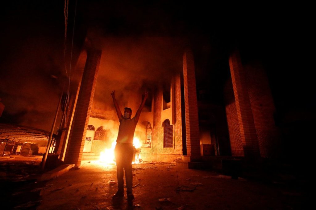 RETRIBUTION — The Iranian consulate in Basra glows as angry residents of Basra burn it, complaining of Iranian interference in Iraqi affairs.