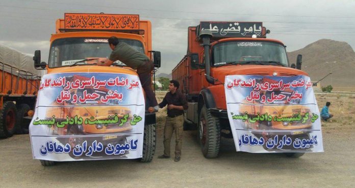 OFF THE ROAD AGAIN — Truck drivers post slogans with their grievances as they go on strike again to protest the regime’s policies. 