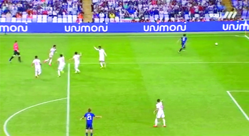 OOOPS! — Iran was knocked out of the Asian Cup with this goof.  Five Iranian players (upper left) argued with the referee that one of them had been fouled by the Japanese player at upper right.  But the ref didn’t blow his whistle.  The Japanese played then went after the ball and set up a Japanese goal.  See full story on the Asian Cup on Page Eight.