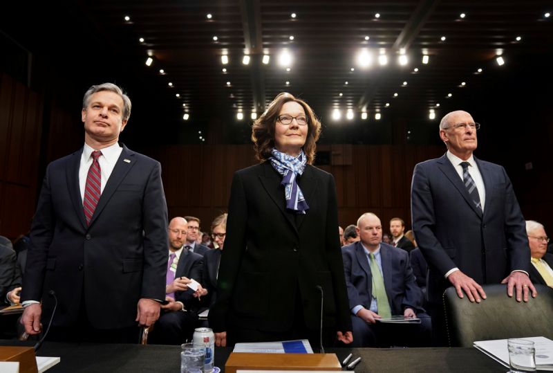 SPY WORLD — Leaders of the US “intelligence community” prepare to testify before Congress.  From right: Director of National Intelligence Dan Coats; CIA Director Gina Haspel; and FBI Director Christopher Wray.