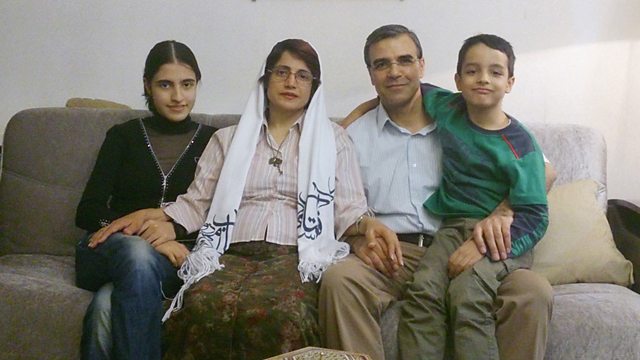 AT HOME — Nasrin Sotoudeh and her husband, Reza Khandan, are seen before their imprisonment with their son and daughter.