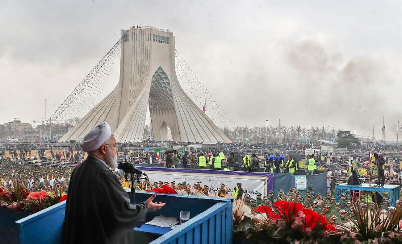 CELEBRATION — President Rohani speaks to the assembled crowd marking the 40th anniversary of the Islamic Revolution in Tehran.