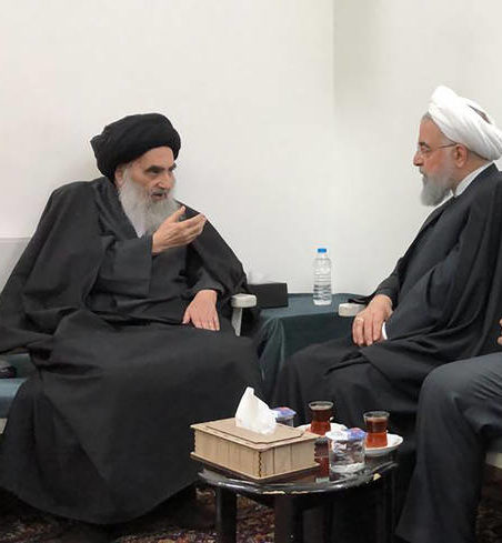 AUDIENCE — Grand Ayatollah Ali Sistani (left) makes his points to visiting President Rohani.