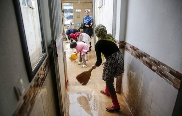SWISH — In many homes, all the kids lined up with brooms to push the water out of their rooms.  But in many places, the water came with a vast quantity of mud and the families must actually dig themselves out after the water level falls.