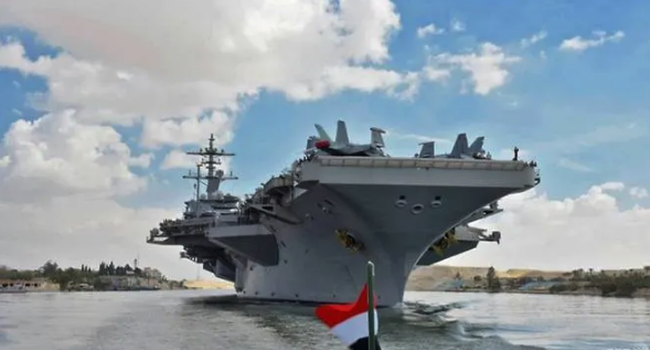 The USS Abraham Lincoln sails through the Suez Canal toward Iran.