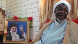 THE BOSS — Ibrahim Zakzaky poses next to a photo of Supreme Leader Ali Khamenehi before being arrested in 2016.