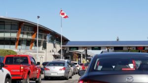 BLAINE BLAME — Motorists line up leaving Canada at the Blaine, Washington, border crossing into the US.