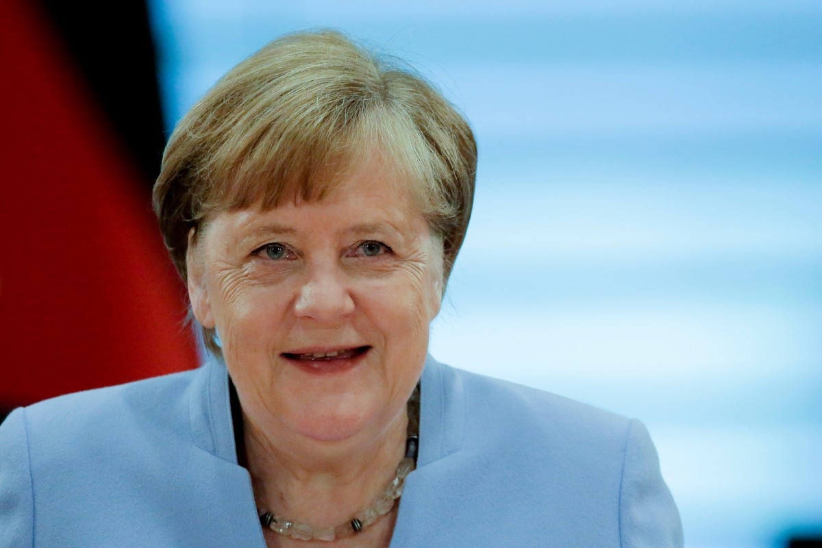 Merkel visits stabbed Iranian refugee