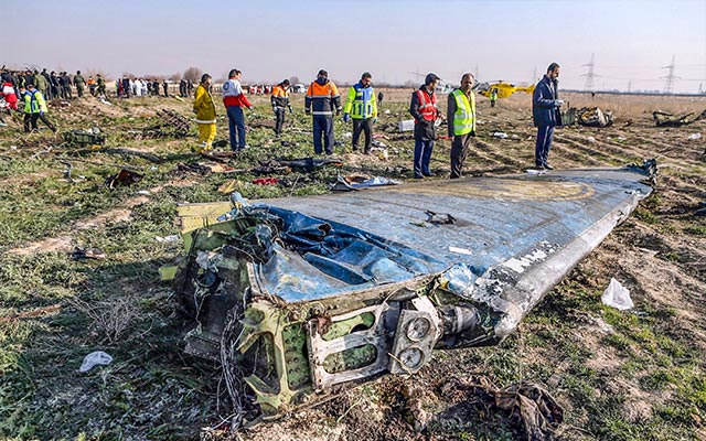 AFTERMATH — The wing of the Ukrainian passenger jet shot down by the Pasdaran lies in a field south of Tehran.