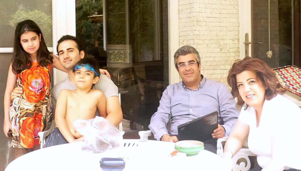 TRIP TO TEHRAN — Amir Hekmati (at right and second from left above) is seen above with his relatives in Tehran that he visited while the FBI suspects he was offering US secrets to the regime.