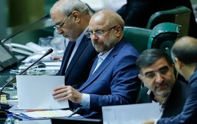 I’M THE BOSS — Mohammad-Baqer Qalibaf (center) presides over a session of the Majlis as it considered the annual budget.