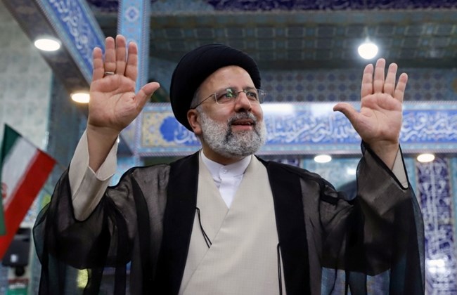 TOP OF POLL — President-elect Ebrahim Raisi acknowledges cheers from his supporters in Tehran.