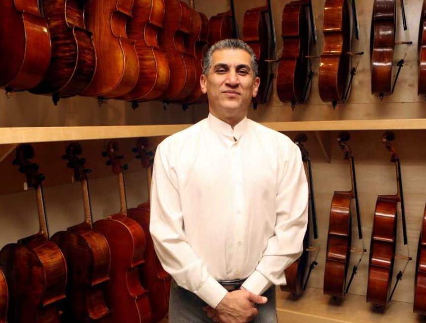 INSTRUMENTAL — Abbas Selgi in his Texas musical instrument store.