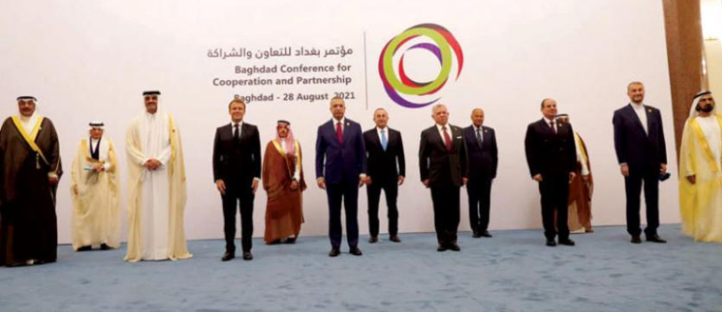 FAUX PAS — New Foreign Minister Hossain Amir-Abdollahian (second from right) made a huge gaff on his first foreign visit.  At a meeting in Baghdad, he was placed in the back row with other foreign ministers for the official photo, but he then stepped forward into the first row reserved for kings, president and prime ministers.  He has not said why he consciously committed this diplomatic gaff.