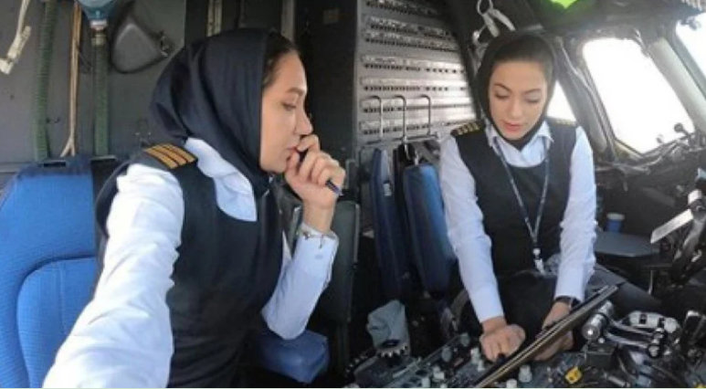 TWO FOR ONE — These women got a lot of attention a few years ago when they became the first case of an all-female cockpit crew for an Iranian airline.