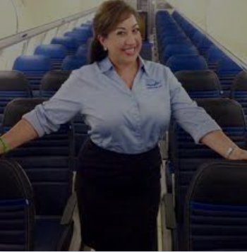 FASTEN YOUR SEATBELTS — Former steward-ess Artemis Bayandor was back on a plane because of her Farsi so she could help Afghans fleeing.