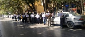 CHANTS AND PLACARDS — Here in Esfahan is one of the many small protests ongoing around the country and mainly focused on local labor issues.