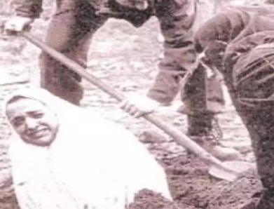 PREPARATION — A photo from four decades ago purported to show a women being prepared for stoning just after the revolution.