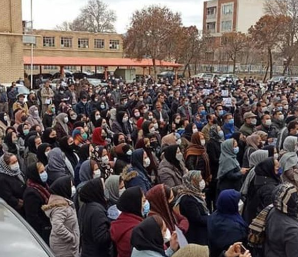 FED UP — This crowd of teachers gathered in front of the Majlis December 23 to object to what the government is offering to pay them.