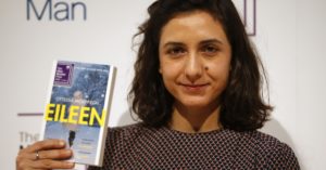 TO CELLULOID — Ottessa Moshfegh holds up a copy of her successful novel, “Eilleen.”