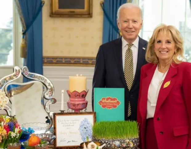 FIRST TIME — President Biden and First Lady Jill Biden pose beside the White House Haft Seen table on Now Ruz. The White House has sometimes put up Haft Seen tables in the past, but this is the first time any president has posed beside one.