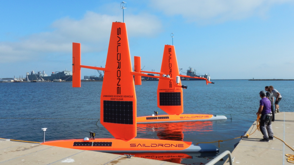 ORANGE SPIES — This is the first US drone ship being deployed in Middle East waters to monitor activities at sea. They are painted bright orange, so they are not exactly “spy” ships, since everyone will see them quite easily.