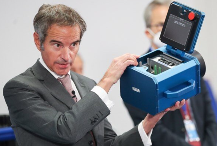 HERE IT IS — IAEA Director General Rafael Grossi of Argentina shows off one of the IAEA’s cameras of the type Iran has now removed from some of its nuclear sites.